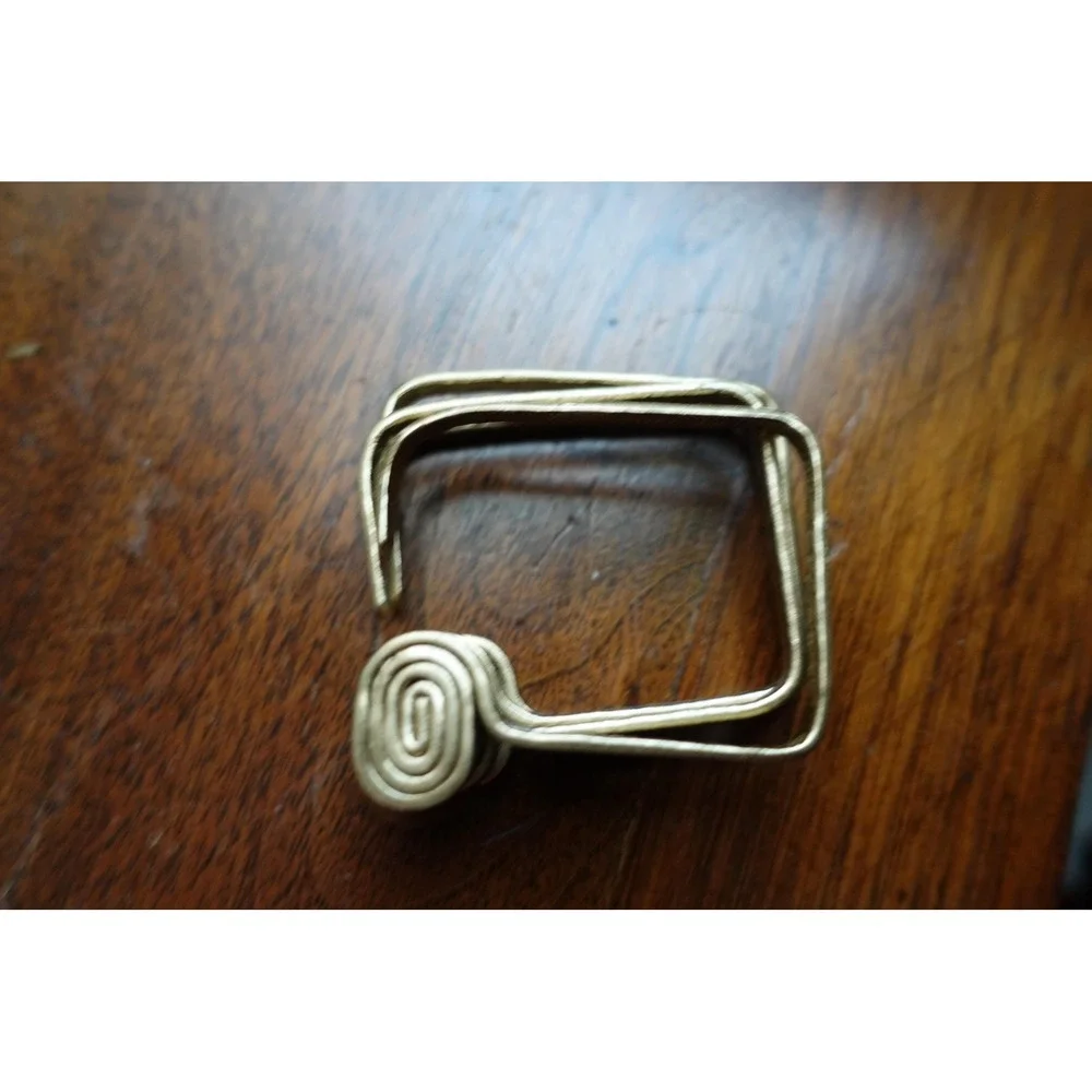 set‎ of 4 Vintage napkin rings metal brass with swirl rectangular design